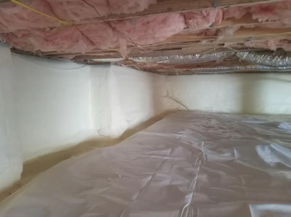 Crawl space encapsulation with closed-cell spray foam for Commercial Roof Restoration in Portales